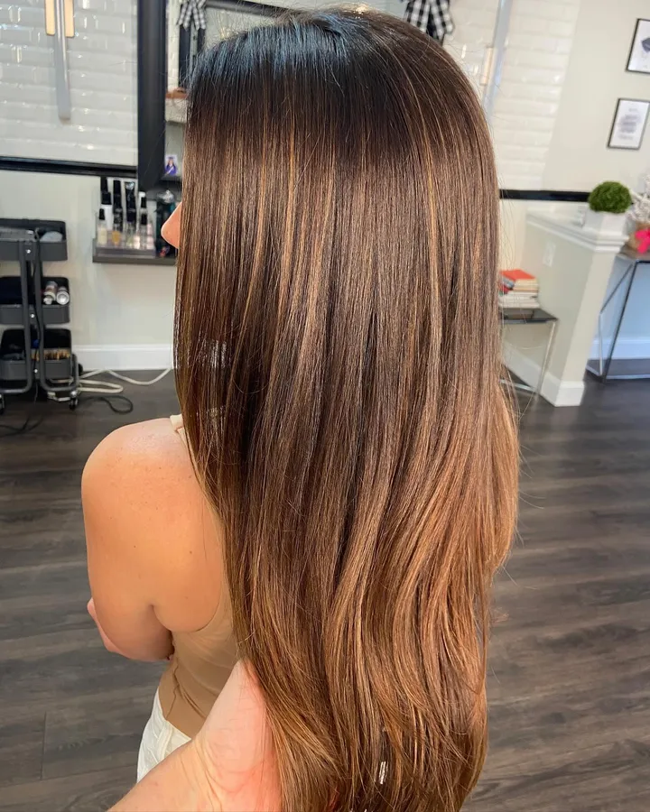 Caramel balayage on long brunette hair